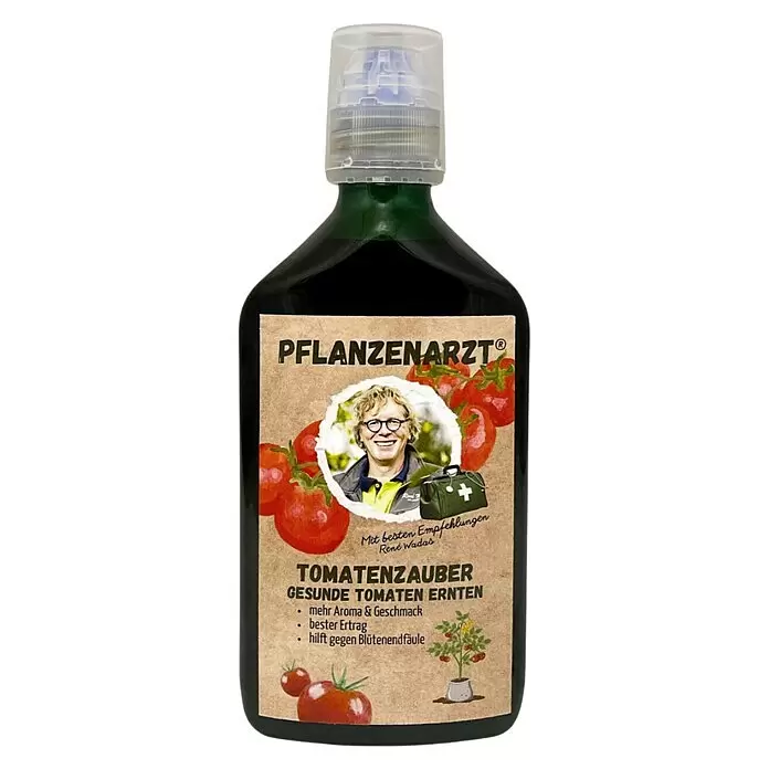 Schacht Pflanzenarzt Tomatendünger Tomatenzauber - 420 g, 350 ml - Dunkelgrüne Flasche mit Etikett für Pflanzenarzt Tomatenzauber, ein Tomatenpflegeprodukt.