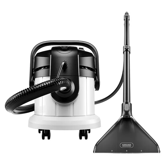 Kärcher Waschsauger SE 4 - 1.000 W, Behältervolumen: 4 l - Das Bild zeigt einen Kärcher Waschsauger mit Sprühextraktionsdüse und Schlauch. Der Sauger ist weiß und schwarz.