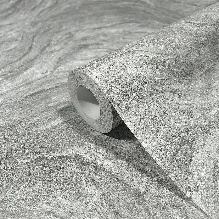 Marburg Struktura Vliestapete Marmoroptik - Grau, Steinoptik, 10,05 x 0,53 m - Nahaufnahme einer Rolle grauer Beton-Tapete mit einem subtilen, strukturierten Muster, ideal für moderne Innenräume.