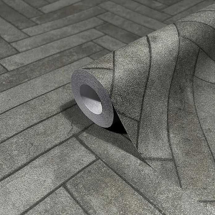 Marburg Struktura Vliestapete Fischgrät - Anthrazit, Steinoptik, 10,05 x 0,53 m - Gerollte Tapete mit einem Muster aus grauen Ziegelsteinen, die eine rustikale und moderne Ästhetik vereint. Perfekt für individuelle Raumgestaltung.