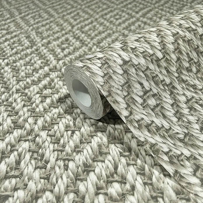 Marburg Struktura Vliestapete 3D-Rauten - Beige/Grau, 3D-Optik, 10,05 x 0,53 m - Nahaufnahme einer Rolle strukturierten Vinyltapete in Grautönen, die ein geflochtenes Webmuster aufweist.