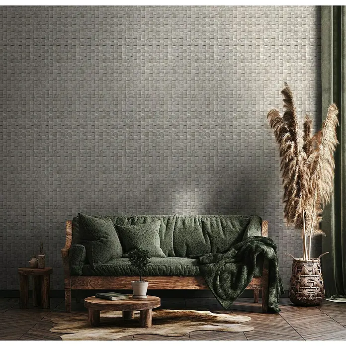 Marburg Struktura Vliestapete 3D-Geflecht - Grau, 3D-Optik, 10,05 x 0,53 m - Wohnzimmer mit grauer Ziegelwand, einem grünen Sofa und Naturholzmöbeln für eine entspannende und stilvolle Atmosphäre.