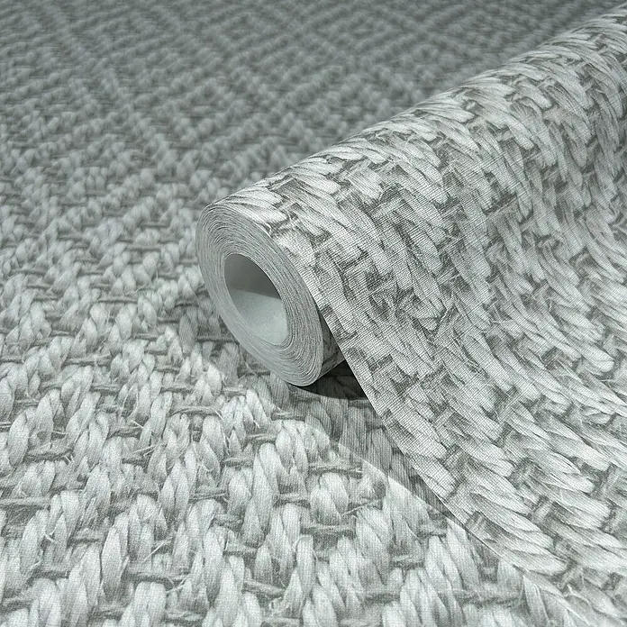 Marburg Struktura Vliestapete 3D-Rauten - Beigegrau, 3D-Optik, 10,05 x 0,53 m - Nahaufnahme einer Rolle grauer, gewebter Textiltapete, die eine natürliche Textur und ein elegantes Design für die Inneneinrichtung bietet.