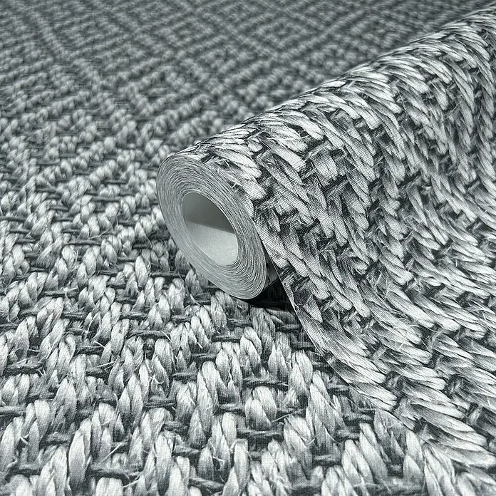 Marburg Struktura Vliestapete 3D-Rauten - Grau, 3D-Optik, 10,05 x 0,53 m - Nahaufnahme einer Rolle grauer Rattan-Tapete, die eine natürliche Textur und ein elegantes Design für die Wanddekoration bietet.
