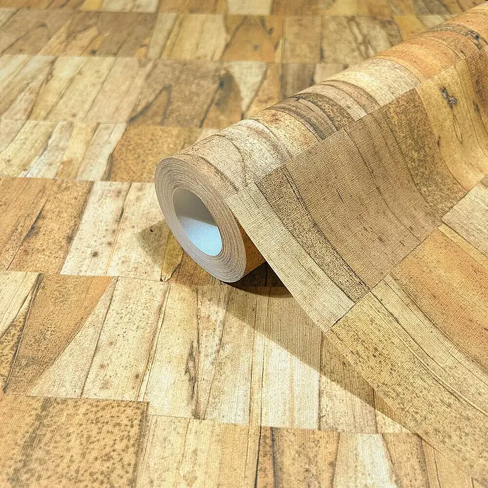 Marburg Struktura Vliestapete Echtholz - Beige, Holzoptik, 10,05 x 0,53 m - Nahaufnahme der strukturierten Holz-Tapetenrolle mit dem Muster aus Holzblöcken, die eine warme und natürliche Atmosphäre vermitteln.