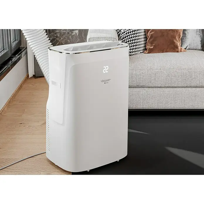 Voltomat Aire acondicionado portátil Hefesto - 3.500 W, Tamaño de la estancia: 35 m², Blanco - Un aire acondicionado portátil en un salón. La unidad es blanca y tiene una pantalla digital.