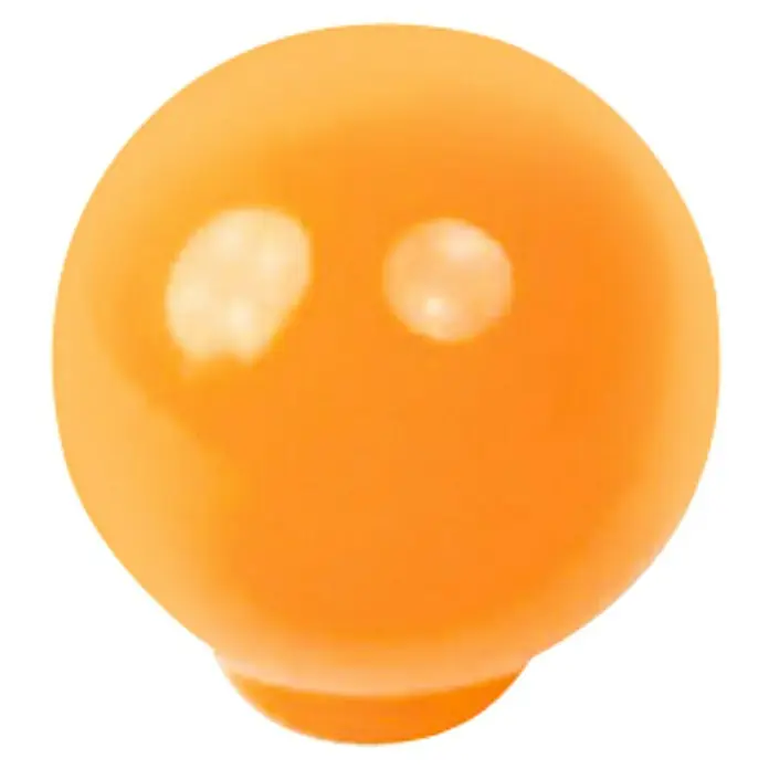 Nesu Pomo para muebles 626 - Tipo de tirador del mueble: Botón, Ø x Al: 34 x 34 mm, Plástico, Naranja, Brillante - Primer plano de un pomo de bola naranja con un acabado brillante, que descansa sobre un fondo negro.