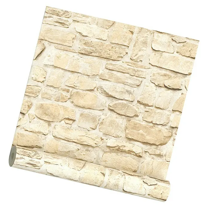 A.S. Création Il Decoro Vliestapete Steine - Beige, Steinoptik, 10,05 x 0,53 m - Nahaufnahme einer Rolle Wandtapete mit Steinmauer-Motiv, die eine rustikale und natürliche Ästhetik bietet. Ideal zur Wandgestaltung.