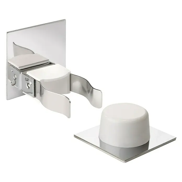 Inofix Tope de puerta 2025 - Metal, Blanco - Un conjunto de tope de puerta con un soporte de pared y un tope separado con base cuadrada.