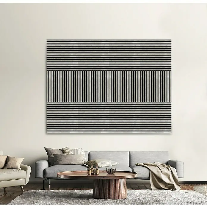 FN Neuhofer Akustikpaneel Acustico - Beton, L x B x S: 560 x 560 x 19 mm - Ein abstraktes Kunstwerk mit horizontalen und vertikalen Streifen hängt über einem modernen Sofa in einem stilvollen Wohnzimmer.