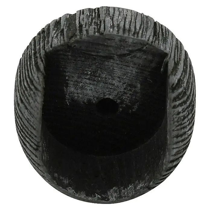 Expo Ambiente Wandlager Domo - Grau, Geeignet für: Gardinenstangen Ø 28 mm - Nahaufnahme eines hölzernen Kerzenhalters mit rustikaler Textur und einem Loch in der Mitte, ideal für stimmungsvolle Beleuchtung.