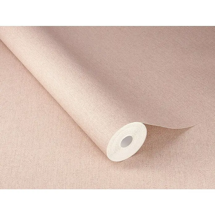 SCHÖNER WOHNEN-Kollektion Cosyliving Vliestapete LINEN - Rosa, Uni, 10,05 x 0,53 m - Nahaufnahme einer Rolle zartrosa Strukturtapete, die eine elegante und textile Optik für die Raumgestaltung bietet.