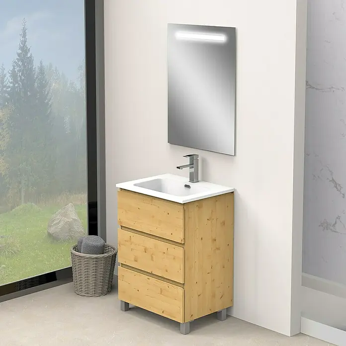 Artysan Conjunto de mueble de baño Atila - Ancho: 60 cm, Pino, 3 pzs. - La imagen muestra un moderno mueble de baño con tres cajones, un lavabo blanco y un espejo iluminado en un baño.