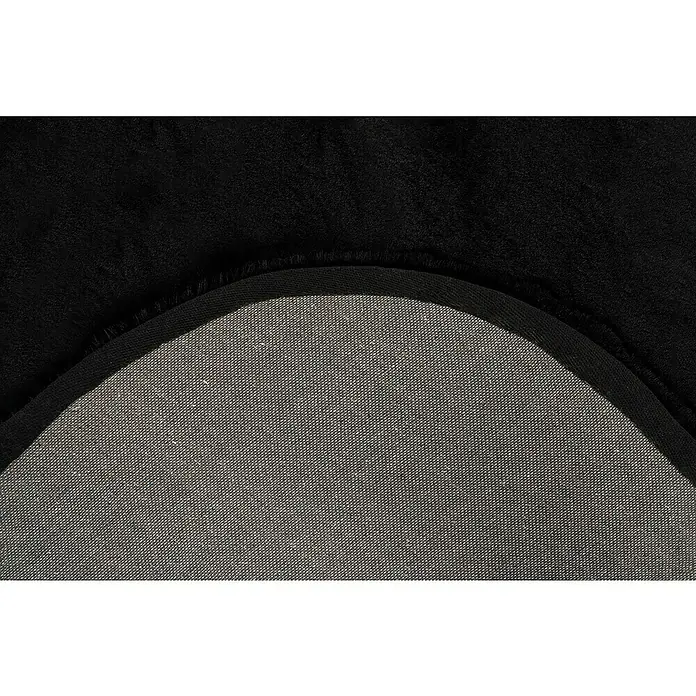 Fellteppich Happy - Schwarz, 230 x 160 cm, Oval, 100 % Polyester (Flor) - Detailaufnahme eines schwarzen runden Teppichs mit sauberer Kante und robuster Unterseite, ideal für stilvolle und praktische Bodengestaltung.