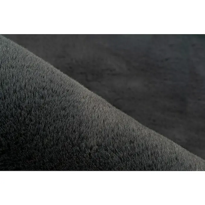 Fellteppich Happy - Graphit, 230 x 160 cm, Oval, 100 % Polyester (Flor) - Nahaufnahme eines grauen Teppichs mit weicher, flauschiger Textur, ideal für ein gemütliches Ambiente im Wohnbereich.