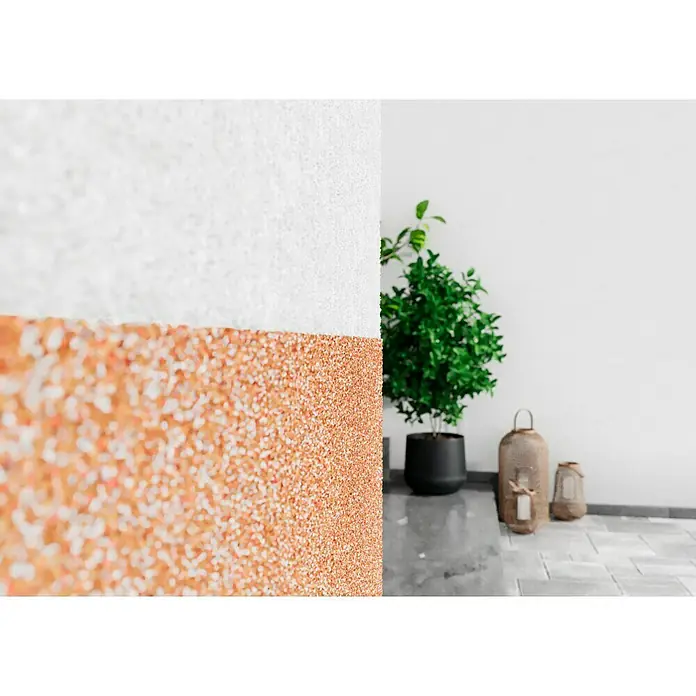 Probau WDVS-Buntsteinputz - Weiß/Orange/Rot, 25 kg - Nahaufnahme einer stilvollen Innenwand mit zweifarbiger Textur, die eine moderne Atmosphäre schafft und das Ambiente des Raumes hervorhebt.