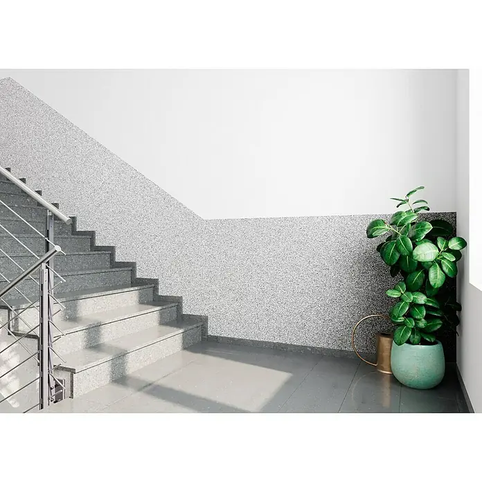 Probau WDVS-Buntsteinputz - Weiß/Schwarz, 25 kg - Eine moderne Treppe mit einem Zimmerpflanze in einem dekorativen Topf, die ein stilvolles Innendesign unterstreicht und einen Hauch von Natur bietet.