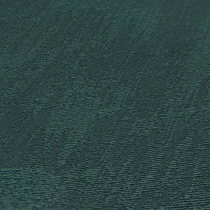 A.S. Création Jade 2 Vliestapete - Dunkles Petrol, Uni, 10,05 x 0,53 m - Detailaufnahme eines dunkelgrünen Stoffes mit feiner, gewebter Textur, ideal für Bekleidung oder Polster.