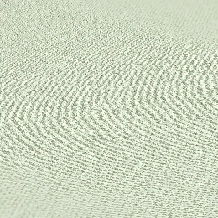 A.S. Création Jade 2 Vliestapete - Pastellgrün, Uni, 10,05 x 0,53 m - Nahaufnahme eines hellbeigen Stoffes mit feiner Textur. Das dezente Muster sorgt für eine ruhige und elegante Optik.
