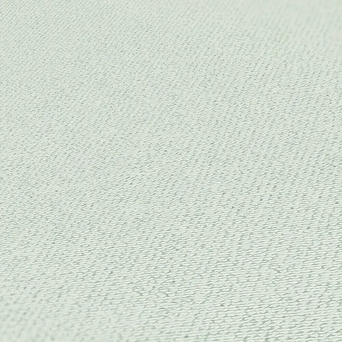 A.S. Création Jade 2 Vliestapete - Mintgrün, Uni, 10,05 x 0,53 m - Nahaufnahme einer hellgrauen Vinyltapete mit dezenter Textur, ideal für moderne Innenräume.\n