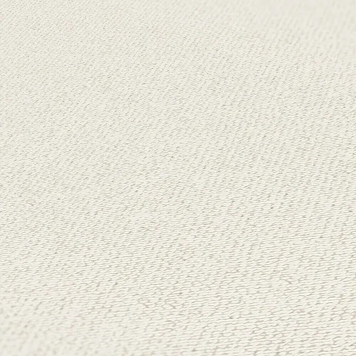 A.S. Création Jade 2 Vliestapete - Creme-Weiß, Uni, 10,05 x 0,53 m - Detailaufnahme eines Stoffes mit feiner, weißer Textur, die sich ideal für Möbel oder Kleidung eignet.\n