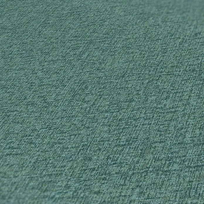 A.S. Création Famous Garden Vliestapete - Petrolblau, Uni, 10,05 x 0,53 m - Nahaufnahme eines türkisfarbenen Stoffes mit einer feinen, texturierten Oberfläche, ideal für Polsterarbeiten und Bekleidung.