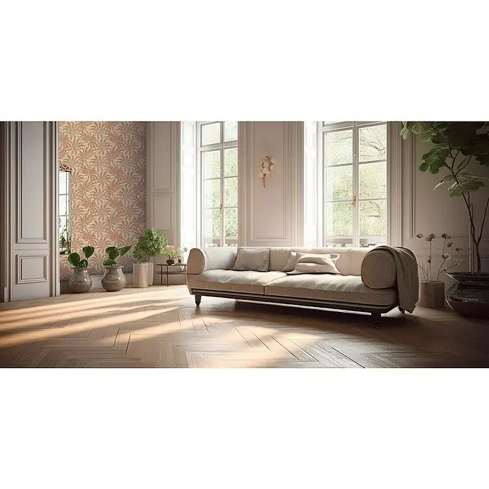 A.S. Création Jade 2 Vliestapete Pflanzen - Beige-Rot-Orange, Floral, 10,05 x 0,53 m - Helles Wohnzimmer mit einem stilvollen Sofa, das zum Entspannen und Verweilen einlädt, ergänzt durch Zimmerpflanzen und Tageslicht.