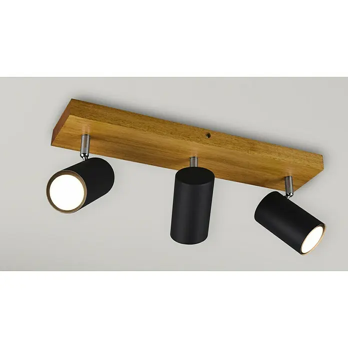Trio Leuchten Marley Deckenstrahler - 105 W, L x B x H: 9 x 44 x 16 cm, Schwarz, GU10, 3 Stk. - Deckenleuchte mit drei Strahlern. Die Strahler sind schwarz und an einem hölzernen Brett befestigt, das an der Decke montiert ist.