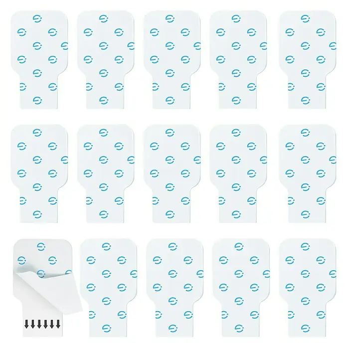 Govee Doppelseitige Klebepads - Passend für: Govee Glide Leuchtpaneele H6061, H6066, H6067 - Eine Nahaufnahme von weißen Elektrodenpads mit blauen Symbolen, eines davon teilweise abgezogen, auf schwarzem Hintergrund.