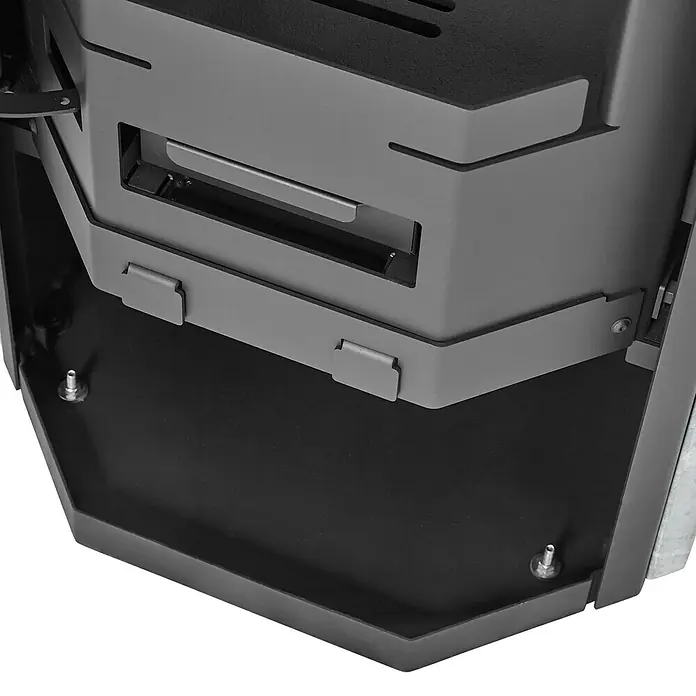 Justus Kaminofen Usedom 5 II - 5,5 kW, Raumheizvermögen: 88 m³, Material Verkleidung: Speckstein, Schwarz/Speckstein - Detailaufnahme eines modernen Kaminofens mit elegantem Design und hochwertiger Verarbeitung.
