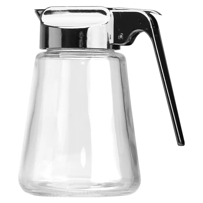 Frasco para miel - Vidrio - Un dispensador de jarabe de vidrio transparente con una tapa de metal brillante y un asa elegante, ideal para mesas de desayuno.