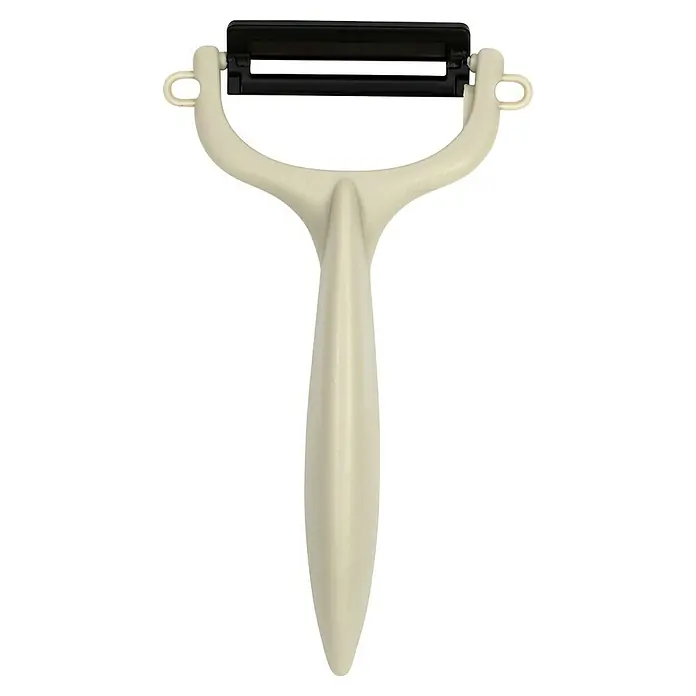 Pelador de verduras - Hoja de cerámica, Beige/Blanco/Negro/Gris/Burdeos, 1 pzs. - Un pelador beige con cuchilla negra, ideal para pelar frutas y verduras fácilmente, asegurando una preparación rápida y sin esfuerzo.