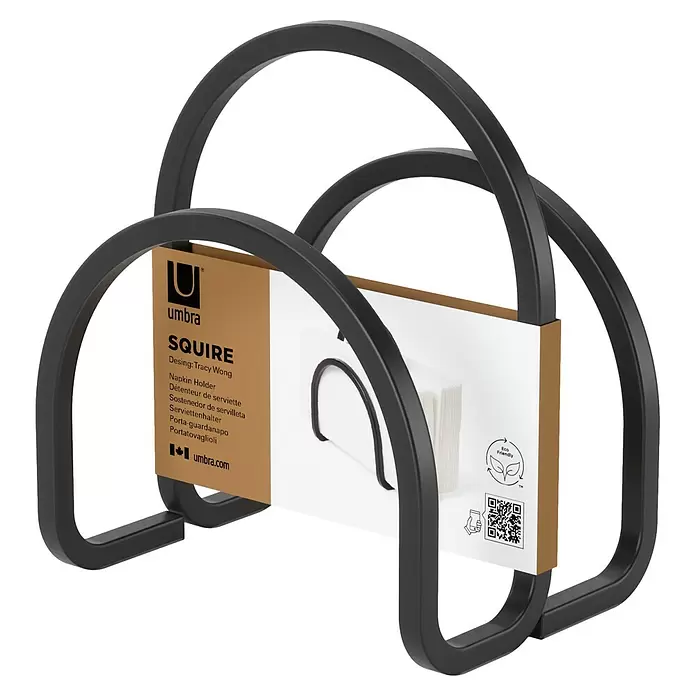 Umbra Serviettenhalter Squire - 12 x 10 x 15 cm, Schwarz - Schwarzer Metall-Serviettenhalter mit braunem und weißem Etikett, das "Umbra Squire" und Produktdetails zeigt.