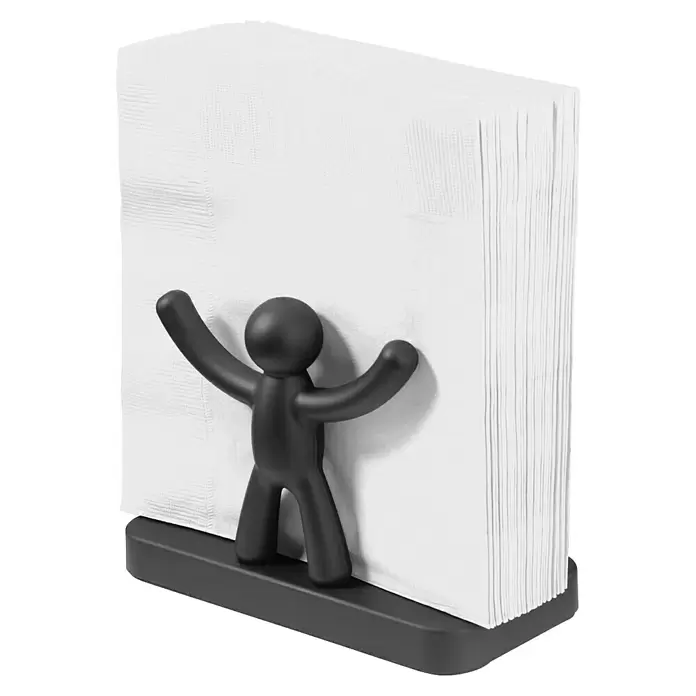 Umbra Serviettenhalter Buddy - 15 x 8 x 11 mm, Schwarz, Kunststoff - Schwarzer Serviettenhalter mit stilisierter Menschenfigur, der weiße Papierservietten hält.