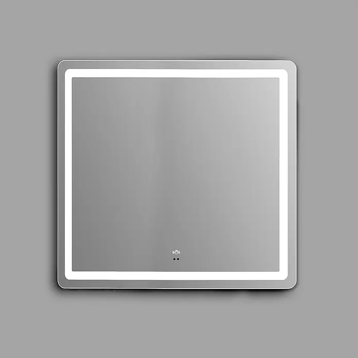 Camargue Lichtspiegel Katia80 x 70 cm, Leuchtmittel - Ein quadratischer LED-beleuchteter Spiegel mit abgerundeten Ecken. Der Spiegel hängt an einer grauen Wand und sorgt für eine moderne Note.