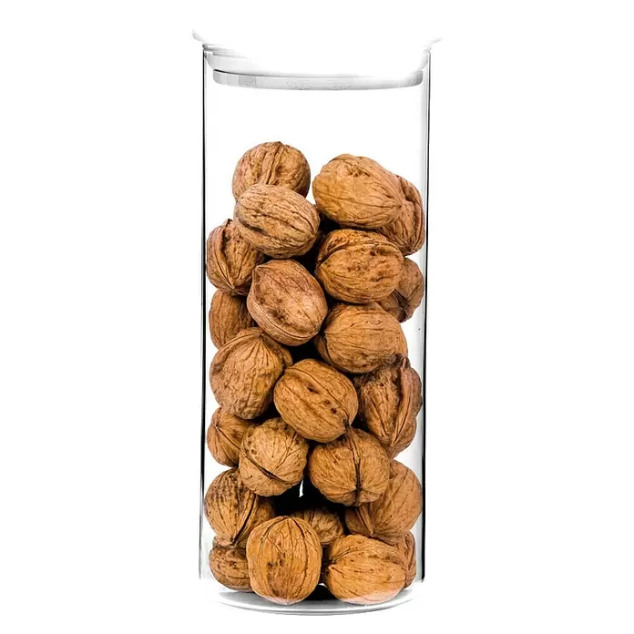 Tescoma Vorratsdosen-Set Fiesta - 1.800 ml, Bambus - Glasgefäß gefüllt mit ganzen braunen Walnüssen, mit weißem Deckel.