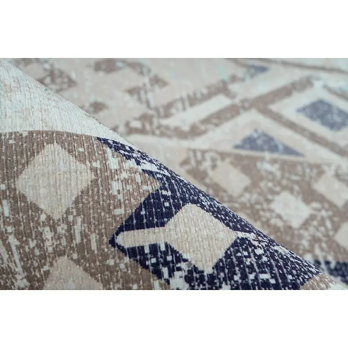 Kayoom Kurzflorteppich Indiana - Multi/Blau, 150 x 80 cm, 100 % Baumwolle - Nahaufnahme eines stilvollen Teppichs mit geometrischem Muster in Beige-, Braun- und Blautönen.