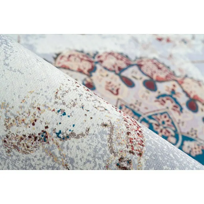 Kayoom Flachgewebeteppich Galaxy - Multi/Blau, 180 x 120 cm, 100 % Polyester - Detailaufnahme eines stilvollen Teppichs mit orientalischem Muster in hellen Farbtönen, der eine elegante Atmosphäre schafft.