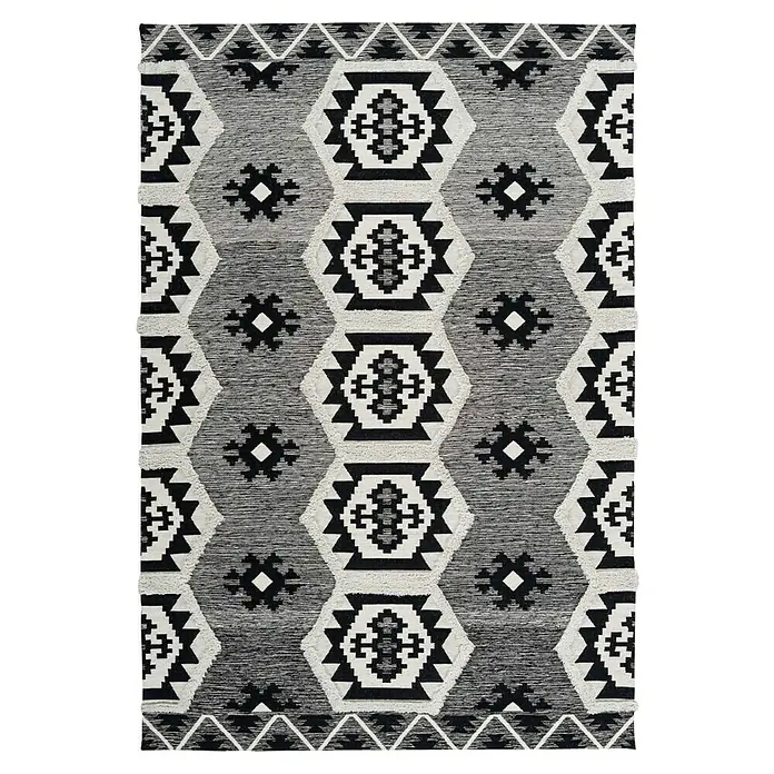 Kayoom Flachgewebeteppich Ethnie II - Grau, 230 x 160 cm, 100 % Baumwolle - Dieser Teppich zeigt ein geometrisches Muster in Schwarz, Weiß und Grau, das jedem Raum einen Hauch von Stammesstil verleiht.