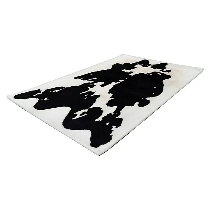 Kayoom Hochflorteppich Kuh - Weiß/Schwarz, 160 x 120 cm, 100 % Polyester - Dieser Teppich im Kuhfell-Design ist ein echter Hingucker. Das schwarz-weiße Muster macht ihn zu einem besonderen Accessoire für jeden Raum.