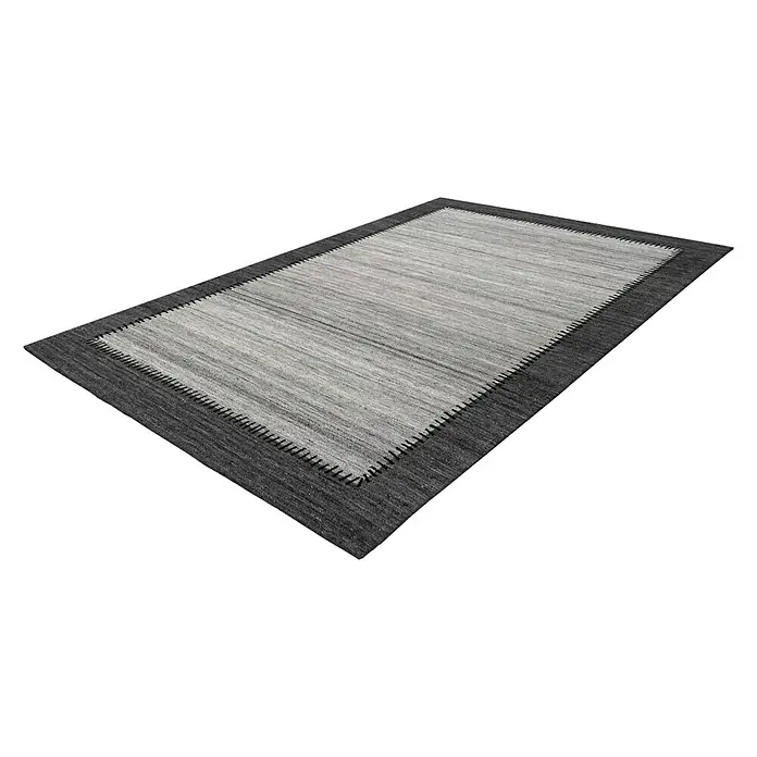 Kayoom Flachgewebeteppich Phoenix - Grau/Anthrazit, 170 x 120 cm, 75 % Wolle - Grauer Teppich mit dunklem Rand, der einen modernen Touch und Wärme in jeden Raum bringt. Der Teppich ist ein echter Hingucker!