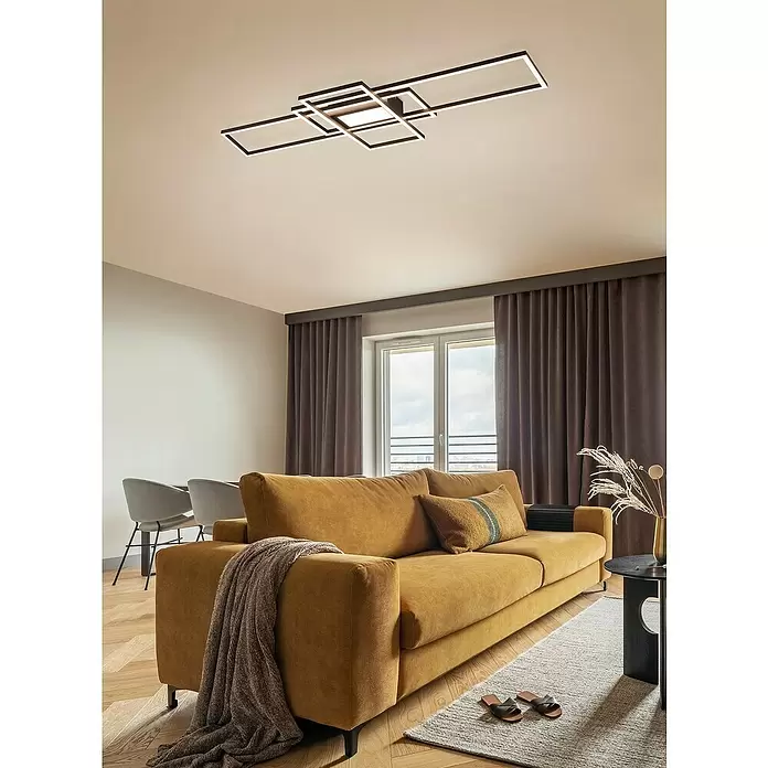 Trio Lighting Plafón LED Irvine - 60 W, L x An x Al: 6,5 x 105 x 42 cm, Blanco - Lámpara de techo negra moderna con marcos rectangulares iluminados interconectados, que ilumina una sala de estar.