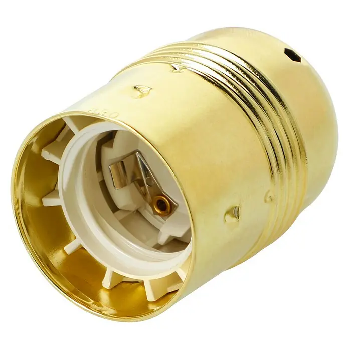 Voltomat Lampenfassung - E27, 100 W - Nahaufnahme einer goldenen Lampenfassung mit weißem Innenleben, ideal für Vintage-Beleuchtungsprojekte.