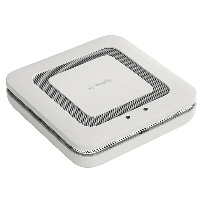 Bosch Smart Home Rauchwarnmelder Twinguard - Batterielaufzeit: 2 Jahre, 41 x 138 x 138 mm - Bosch Sicherheitsmelder: Ein weißes, quadratisches Gerät mit Lüftungsgittern und dem Bosch-Logo, das für Sicherheit sorgt.\n