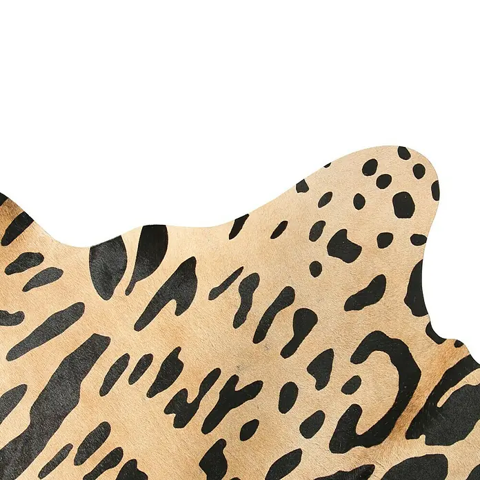 Esbeco Kuhfell - 100 % Echtfell, Jaguar - Detailansicht eines Teppichs mit Tiermuster in Beige- und Schwarztönen, ideal für ein stilvolles Wohnambiente.