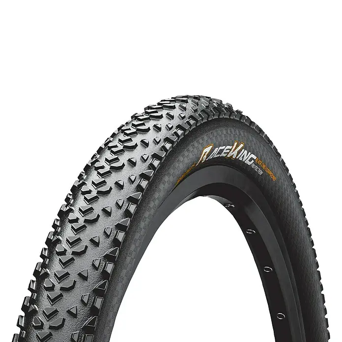 Continental Fahrradreifen Race King - Durchmesser Rad: 29 ", Geeignet für: Mountainbike-Räder, Pannensicher - Nahaufnahme eines Continental Race King Fahrradreifens mit Stollenprofil auf einer Felge vor schwarzem Hintergrund.