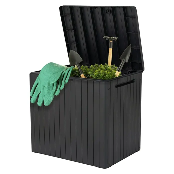 Keter Auflagenbox City Box - 44 x 578 x 55 cm, Kunststoff, Anthrazit - Gartenbox aus schwarzem Kunststoff mit offenem Deckel, gefüllt mit Gartengeräten und grünen Handschuhen.