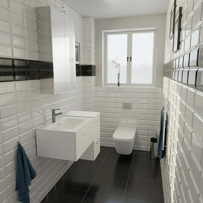 Camargue Espacio Badmöbel-Set H31 - 90 cm, Mira - Ein modernes Badezimmer mit einem weißen Waschtisch, einer Toilette und schwarzen Bodenfliesen für einen stilvollen Look.