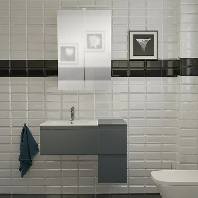 Camargue Espacio Badmöbel-Set H34 - 90 cm, Gama anthrazit matt - Ein modernes Badezimmer mit grauen Waschtischunterschränken, weißem Waschbecken und Spiegelschrank vor weiß gefliesten Wänden mit schwarzem Akzent.