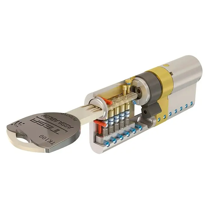 Tesa Assa Abloy Cilindro de perfil de seguridad TK100 - Número de llaves: 5 ud., Longitud total interior/exterior: 40/40 mm, Latón - Cilindro de bloqueo TESA ASSA ABLOY TK100 con llave, que muestra los mecanismos internos.